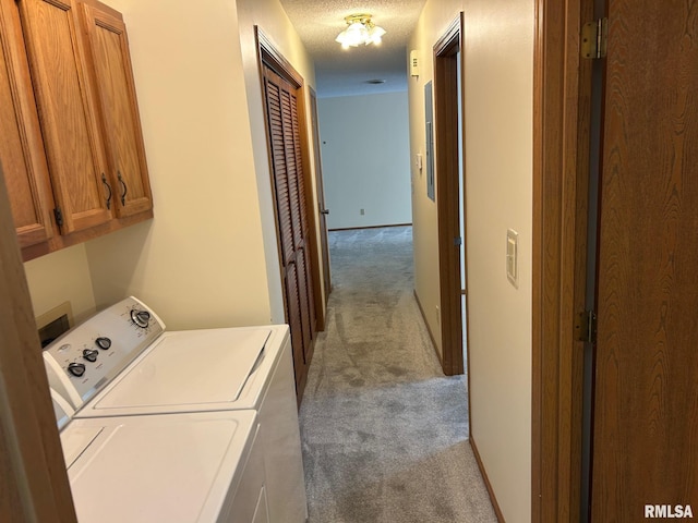 100 E Heights Ave, Taylorville, IL 62568 - washroom with carpet floors, washing machine and dryer, cabinet space, and a textured ceiling