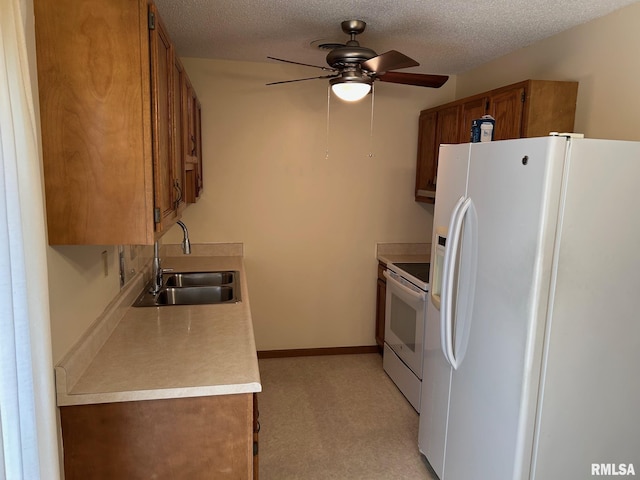100 E Heights Ave, Taylorville, IL 62568 - kitchen with white appliances, brown cabinetry, ceiling fan, light colored carpet, and light countertops