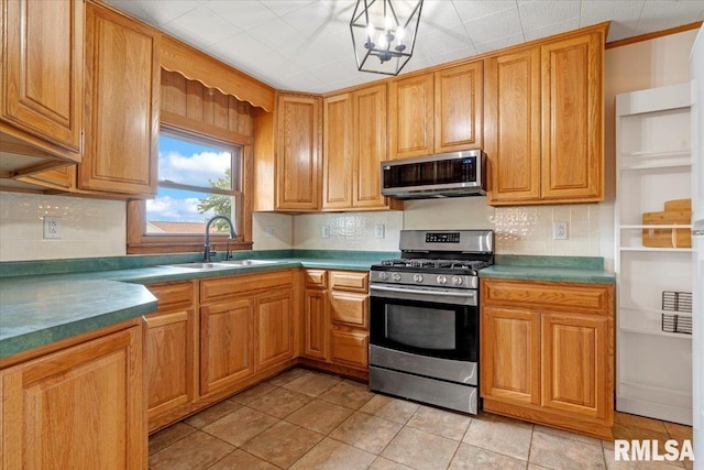 240 Mine Ave, Girard, IL 62640 - kitchen featuring appliances with stainless steel finishes, tasteful backsplash, and a chandelier