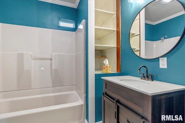 240 Mine Ave, Girard, IL 62640 - bathroom featuring ornamental molding, vanity, and tub / shower combination