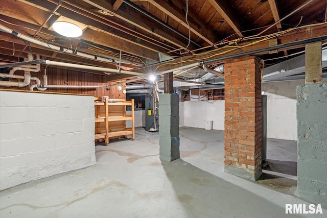 240 Mine Ave, Girard, IL 62640 - unfinished below grade area featuring heating unit