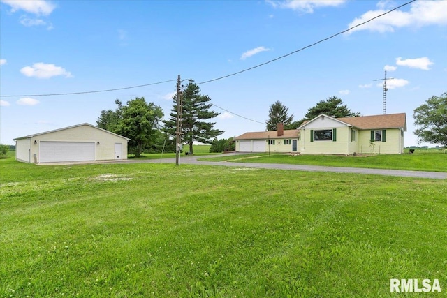 240 Mine Ave, Girard, IL 62640 - view of grassy yard with a detached garage