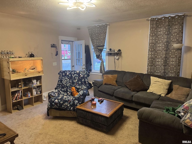 1238 N 12th St, Quincy, IL 62301 - carpeted living area featuring a textured ceiling