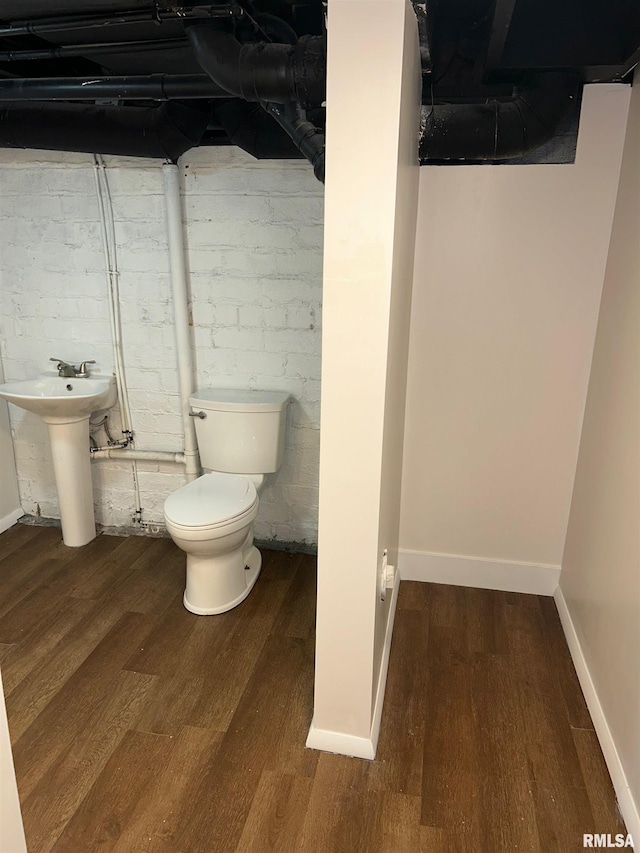 516 E Ash St, Springfield, IL 62703 - half bath featuring wood finished floors and toilet
