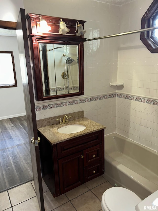 516 E Ash St, Springfield, IL 62703 - full bathroom with vanity, tile patterned floors, and  shower combination