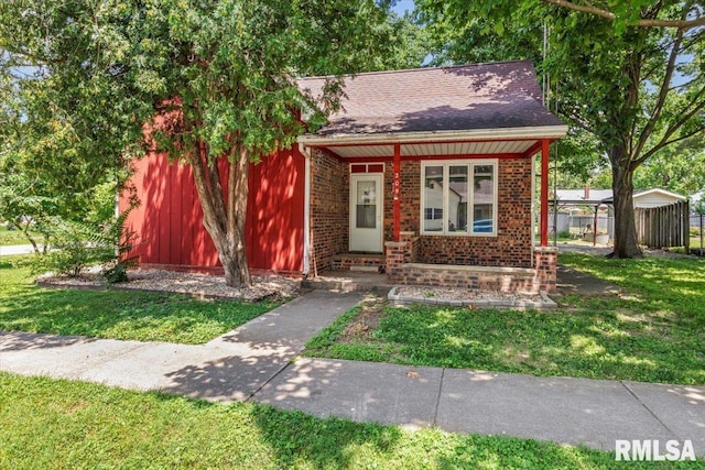 209 W Madison St, Athens, IL 62613 - view of front of house featuring brick siding and entry steps
