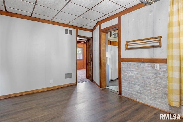209 W Madison St, Athens, IL 62613 - empty room with wood finished floors and a drop ceiling