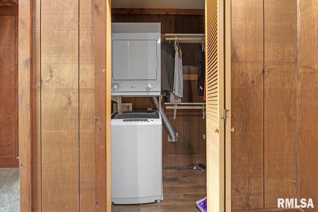 209 W Madison St, Athens, IL 62613 - laundry room with stacked washer and clothes dryer and wood finished floors