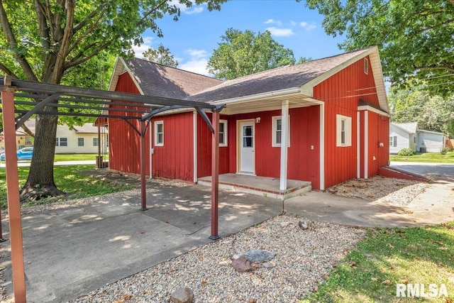 209 W Madison St, Athens, IL 62613 - view of front of house with a shingled roof