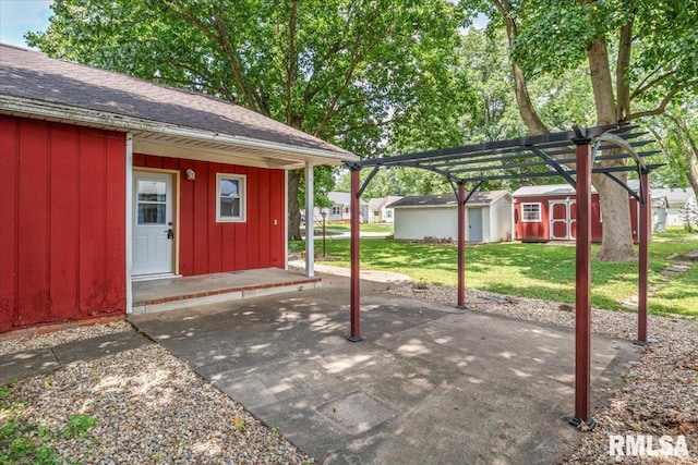 209 W Madison St, Athens, IL 62613 - view of patio / terrace featuring a storage unit