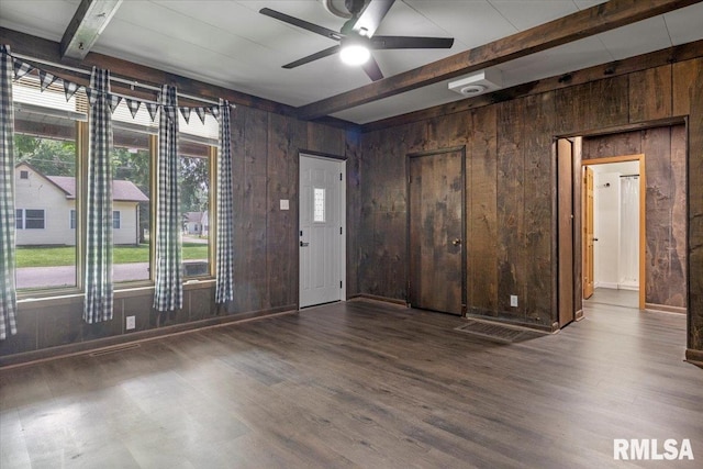 209 W Madison St, Athens, IL 62613 - entryway featuring wood walls, beam ceiling, a ceiling fan, and wood finished floors