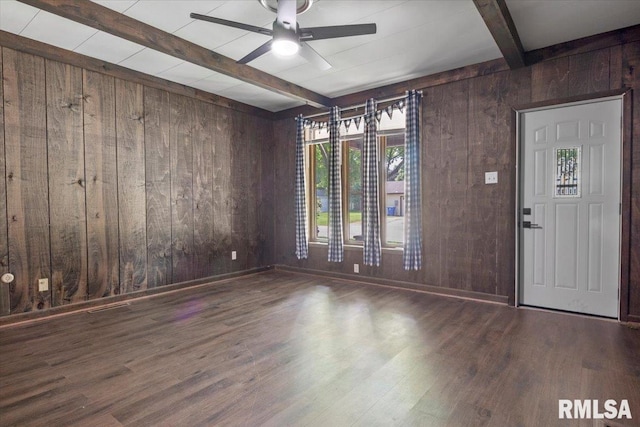 209 W Madison St, Athens, IL 62613 - entrance foyer with wooden walls, beamed ceiling, a ceiling fan, and wood finished floors