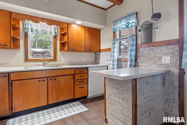 209 W Madison St, Athens, IL 62613 - kitchen with white dishwasher, open shelves, light countertops, and crown molding