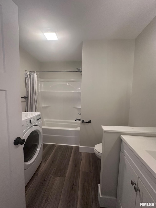 2016 Chestnut St, Quincy, IL 62301 - bathroom with washer / dryer, wood finished floors, vanity, and shower / tub combo