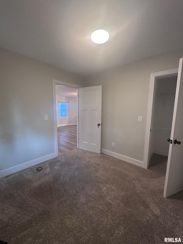 2016 Chestnut St, Quincy, IL 62301 - unfurnished bedroom featuring carpet flooring and baseboards