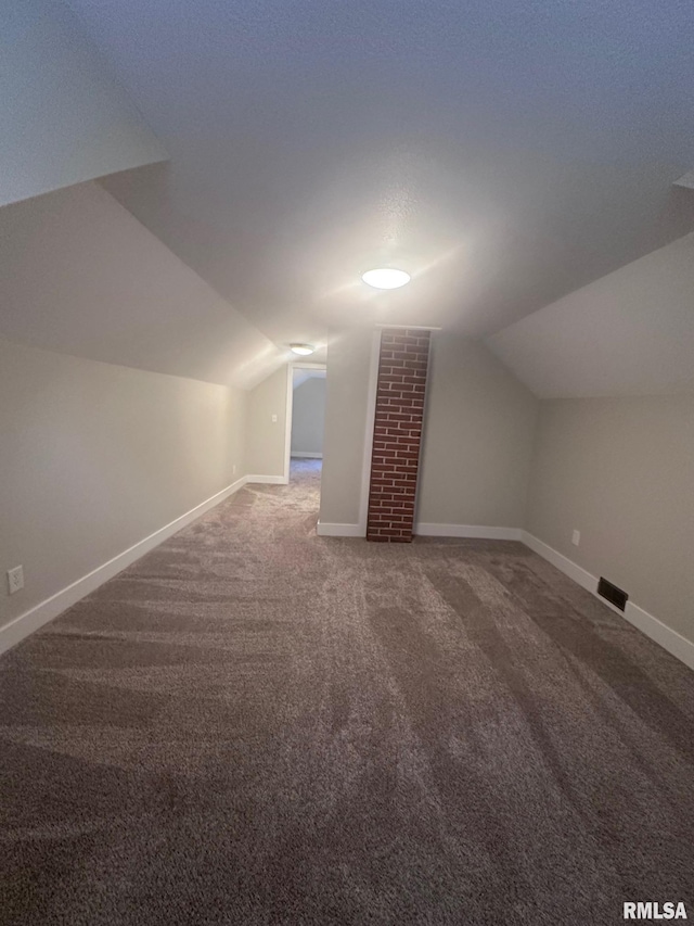 2016 Chestnut St, Quincy, IL 62301 - additional living space with carpet flooring and lofted ceiling