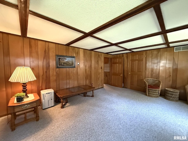 597 Walnut St, Knoxville, IL 61448 - sitting room with carpet flooring, wooden walls, and beam ceiling
