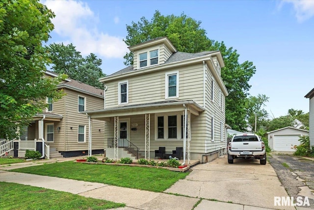 826 S Douglas Ave, Springfield, IL 62704 - american foursquare style home featuring a front yard, a garage, an outdoor structure, and a porch