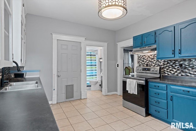 826 S Douglas Ave, Springfield, IL 62704 - kitchen featuring stainless steel electric stove, under cabinet range hood, blue cabinets, light tile patterned flooring, and backsplash
