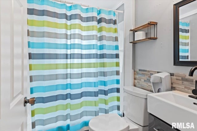 826 S Douglas Ave, Springfield, IL 62704 - full bathroom featuring tile walls, curtained shower, and wainscoting