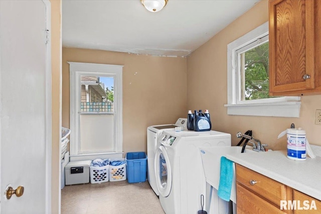 826 S Douglas Ave, Springfield, IL 62704 - laundry area featuring cabinet space and separate washer and dryer