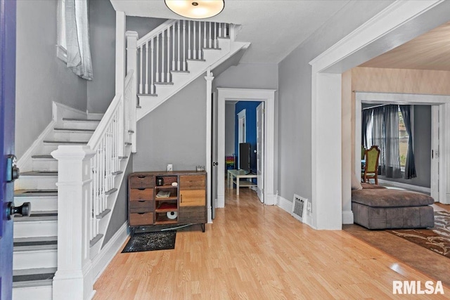 826 S Douglas Ave, Springfield, IL 62704 - foyer entrance featuring stairs and wood finished floors