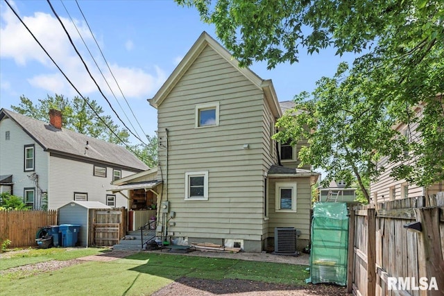826 S Douglas Ave, Springfield, IL 62704 - rear view of house with a shed and a fenced backyard