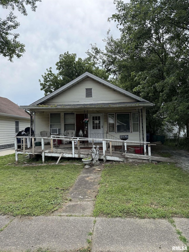 2129 N 16th St, Springfield, IL 62702 - view of front of property with a front lawn and a porch