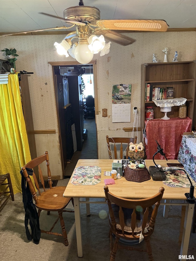 2129 N 16th St, Springfield, IL 62702 - dining area featuring a ceiling fan, wallpapered walls, and carpet flooring
