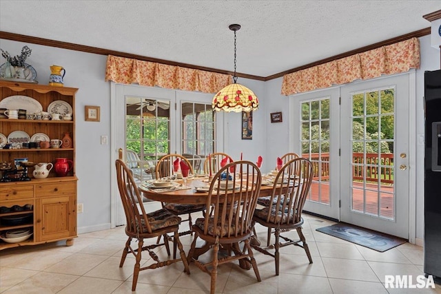 828 Coventry Pt, Springfield, IL 62702 - dining area featuring ornamental molding, light tile patterned flooring, a textured ceiling, and ceiling fan