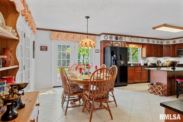 828 Coventry Pt, Springfield, IL 62702 - dining room with crown molding, light tile patterned floors, french doors, and a textured ceiling