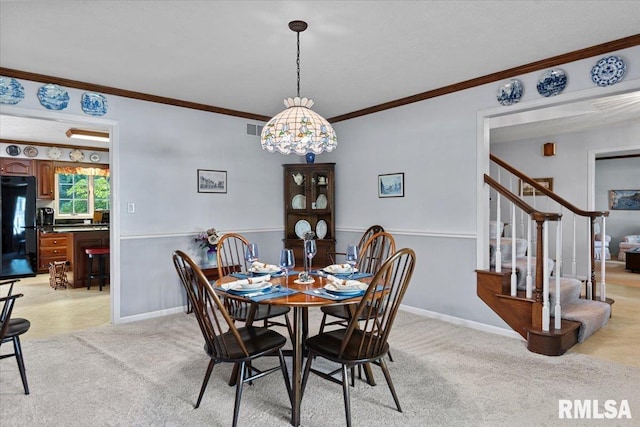 828 Coventry Pt, Springfield, IL 62702 - dining area with stairway, ornamental molding, and light colored carpet