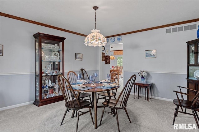 828 Coventry Pt, Springfield, IL 62702 - dining area with ornamental molding and carpet