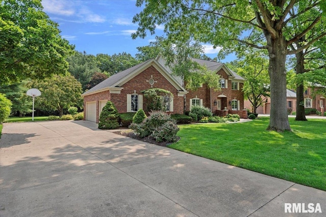 828 Coventry Pt, Springfield, IL 62702 - view of front facade featuring brick siding, a front yard, driveway, and an attached garage
