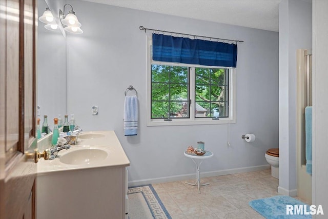 828 Coventry Pt, Springfield, IL 62702 - bathroom featuring double vanity and a chandelier