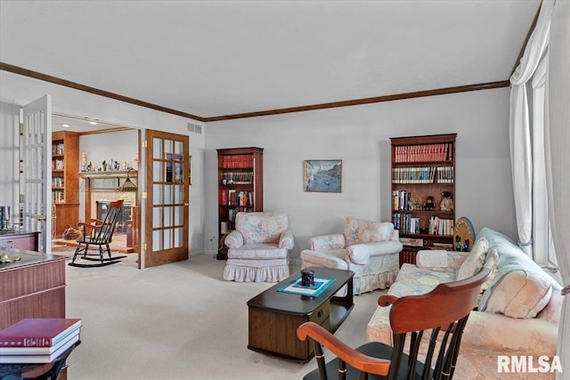 828 Coventry Pt, Springfield, IL 62702 - living area with ornamental molding, french doors, and carpet floors