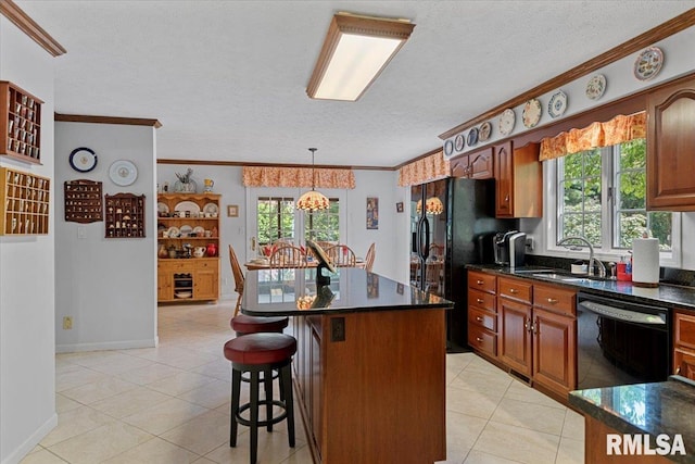 828 Coventry Pt, Springfield, IL 62702 - kitchen with black appliances, ornamental molding, a center island, a breakfast bar area, and plenty of natural light