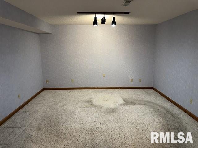 2524 Greenbriar Rd, Springfield, IL 62704 - carpeted spare room featuring rail lighting and baseboards