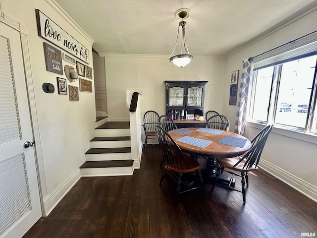 120 S Walnut St, Assumption, IL 62510 - dining area featuring hardwood / wood-style flooring, ornamental molding, and stairway