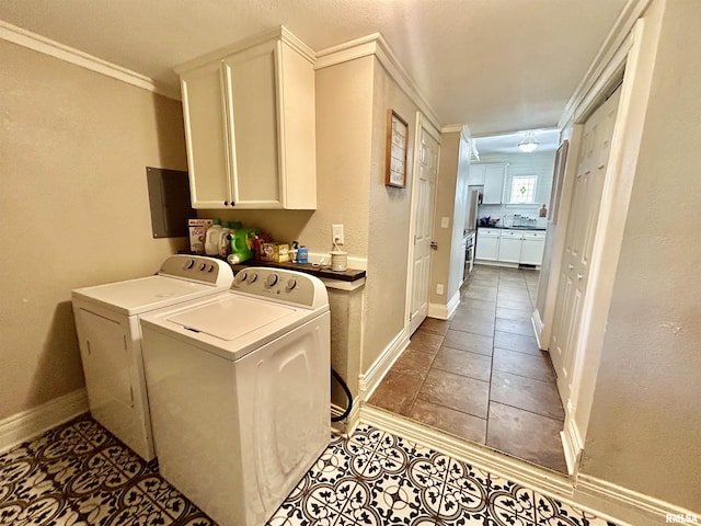 120 S Walnut St, Assumption, IL 62510 - laundry room featuring independent washer and dryer, tile patterned flooring, cabinet space, and crown molding