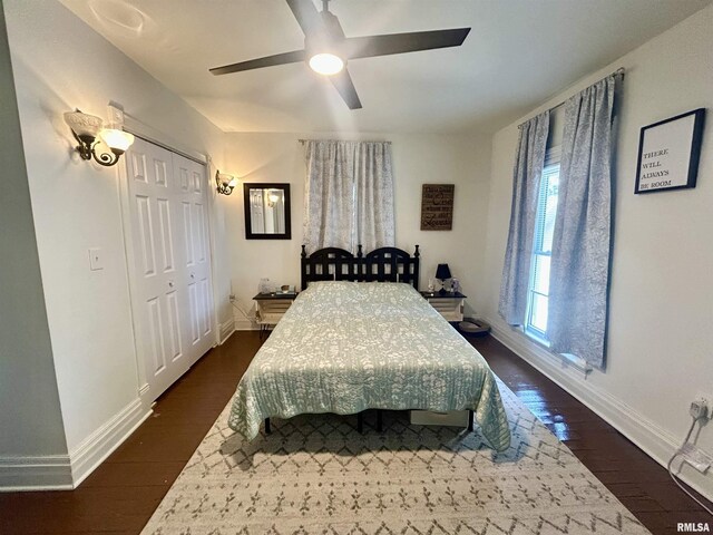 120 S Walnut St, Assumption, IL 62510 - bedroom with dark wood-style flooring, ceiling fan, and a closet