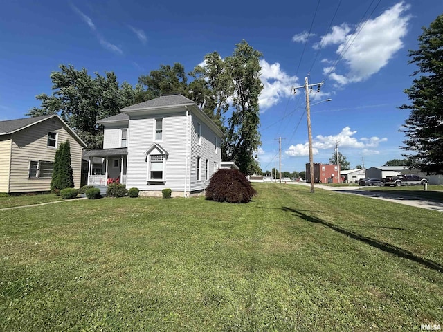 120 S Walnut St, Assumption, IL 62510 - view of property exterior featuring a yard