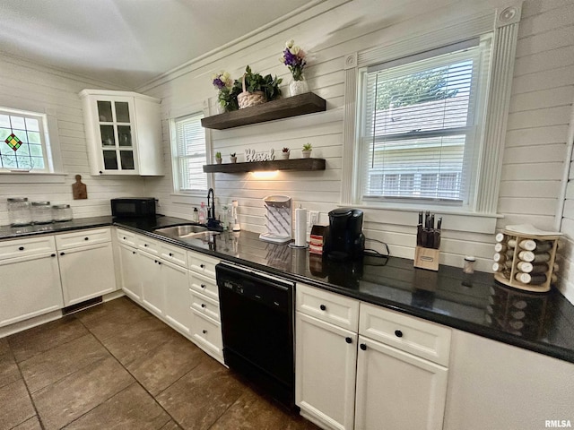 120 S Walnut St, Assumption, IL 62510 - kitchen with black dishwasher, plenty of natural light, dark countertops, dark tile patterned floors, and crown molding
