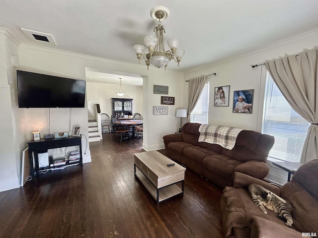120 S Walnut St, Assumption, IL 62510 - living area featuring a chandelier, wood-type flooring, and crown molding