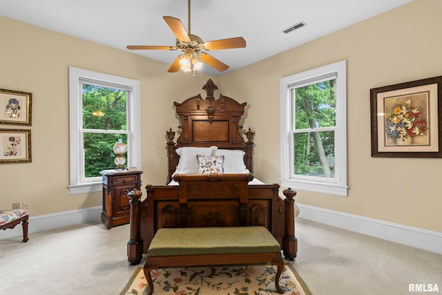 1125 Williams Blvd, Springfield, IL 62704 - bedroom with carpet floors, multiple windows, and ceiling fan