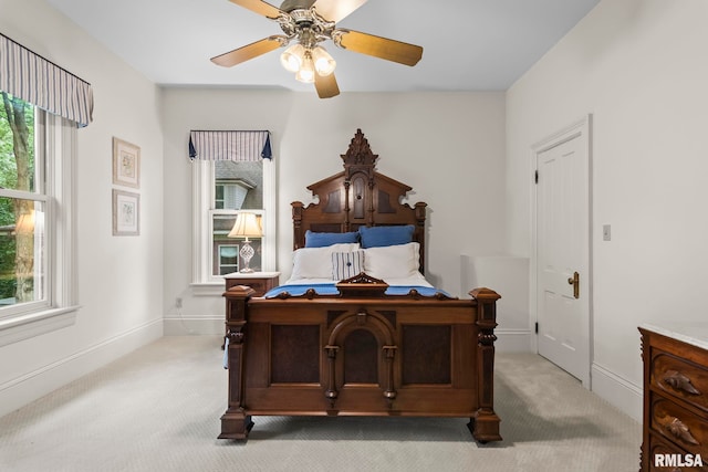 1125 Williams Blvd, Springfield, IL 62704 - bedroom with light colored carpet and a ceiling fan