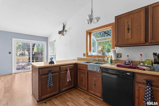 2924 Flowerbrook Ct, Springfield, IL 62702 - kitchen featuring dishwasher, a peninsula, light wood-style flooring, light countertops, and lofted ceiling