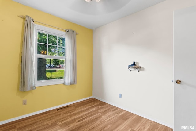 2924 Flowerbrook Ct, Springfield, IL 62702 - empty room with wood finished floors and baseboards