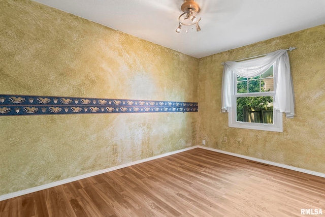 2924 Flowerbrook Ct, Springfield, IL 62702 - unfurnished room with wood finished floors and baseboards