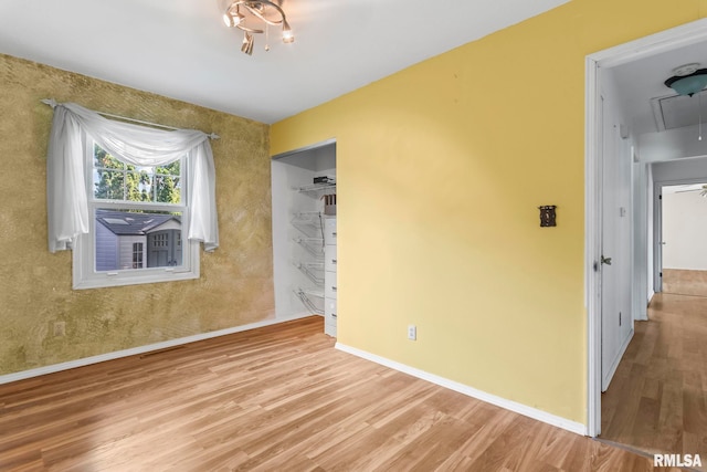 2924 Flowerbrook Ct, Springfield, IL 62702 - unfurnished bedroom with attic access and wood finished floors